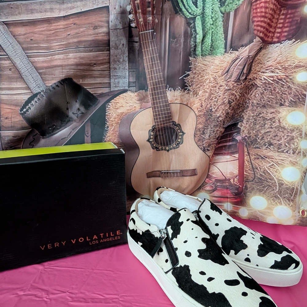 Very Volatile Cow Print Slip-On Sneakers